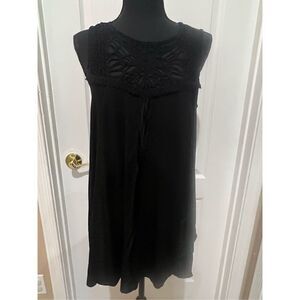 Torrid black sleeveless top with lace detailing
